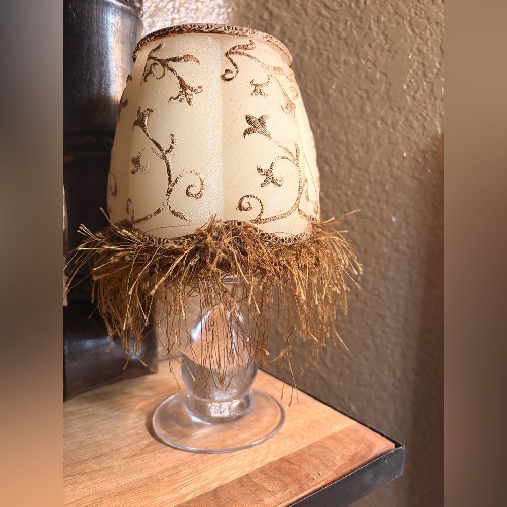 CANDLE-Elegant Cream and Gold Feather-candle with glass stand.